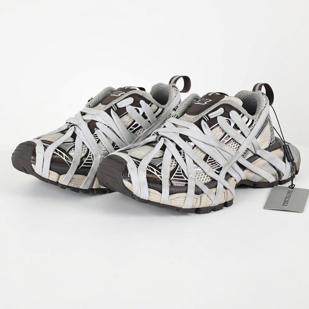 Balenciaga 3XL silver and black sneakers on white background, view 1